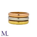 CARTIER. A Trinity Ring in 18K yellow, white and rose gold. Signed Cartier London and marked 18ct.