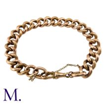 A 'Night and Day' Curb Bracelet in 9K rose gold secured with a dog clip clasp. Clasp marked for