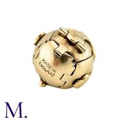 A Masonic Orb Pendant in 9k yellow gold and silver, the hinged spherical body opens to display a
