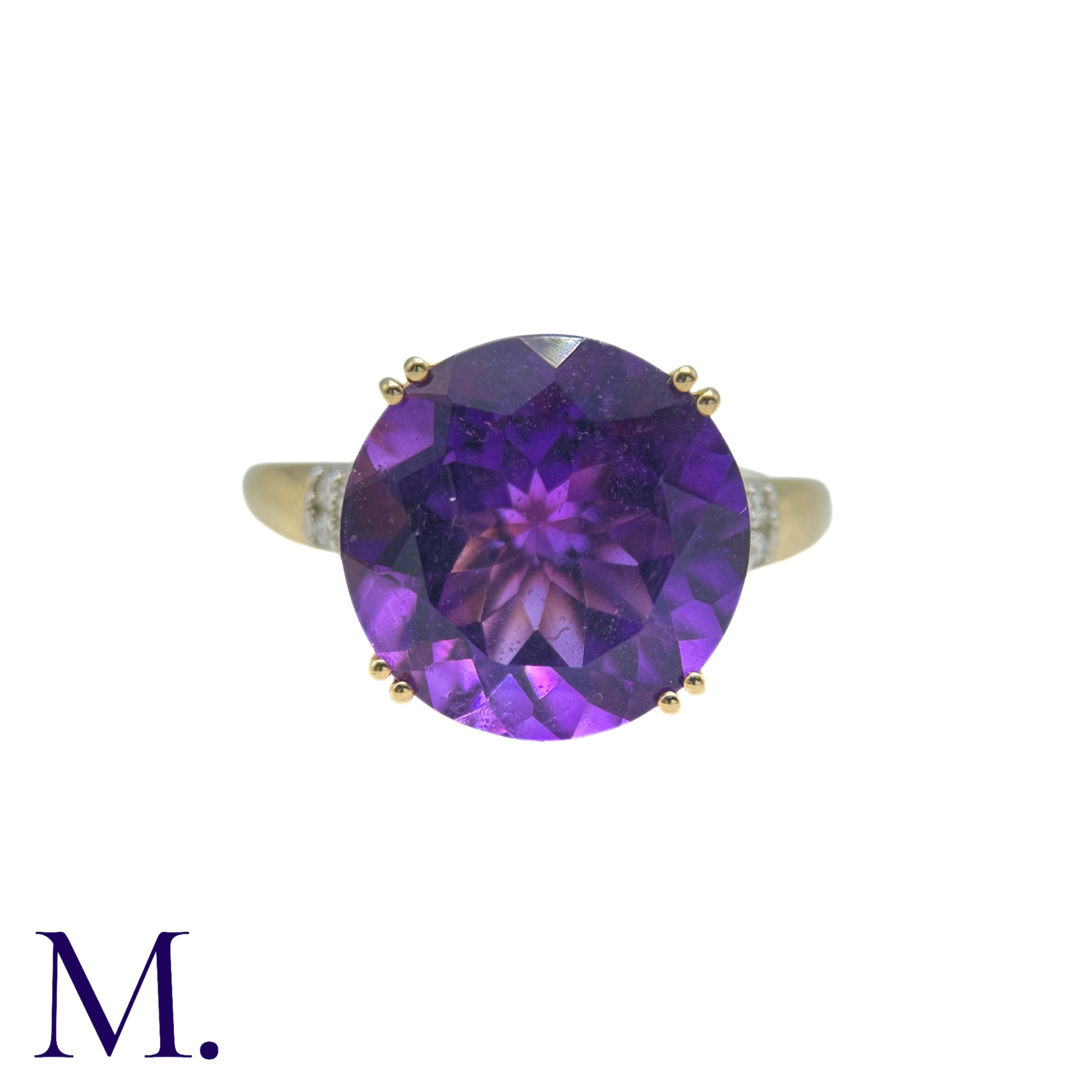 An Amethyst And Diamond Ring in 14k yellow gold, set with a principal round cut amethyst of