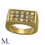 A Diamond-Set Signet Ring in 18K yellow gold, with textured, matt-finish band, set with three rows