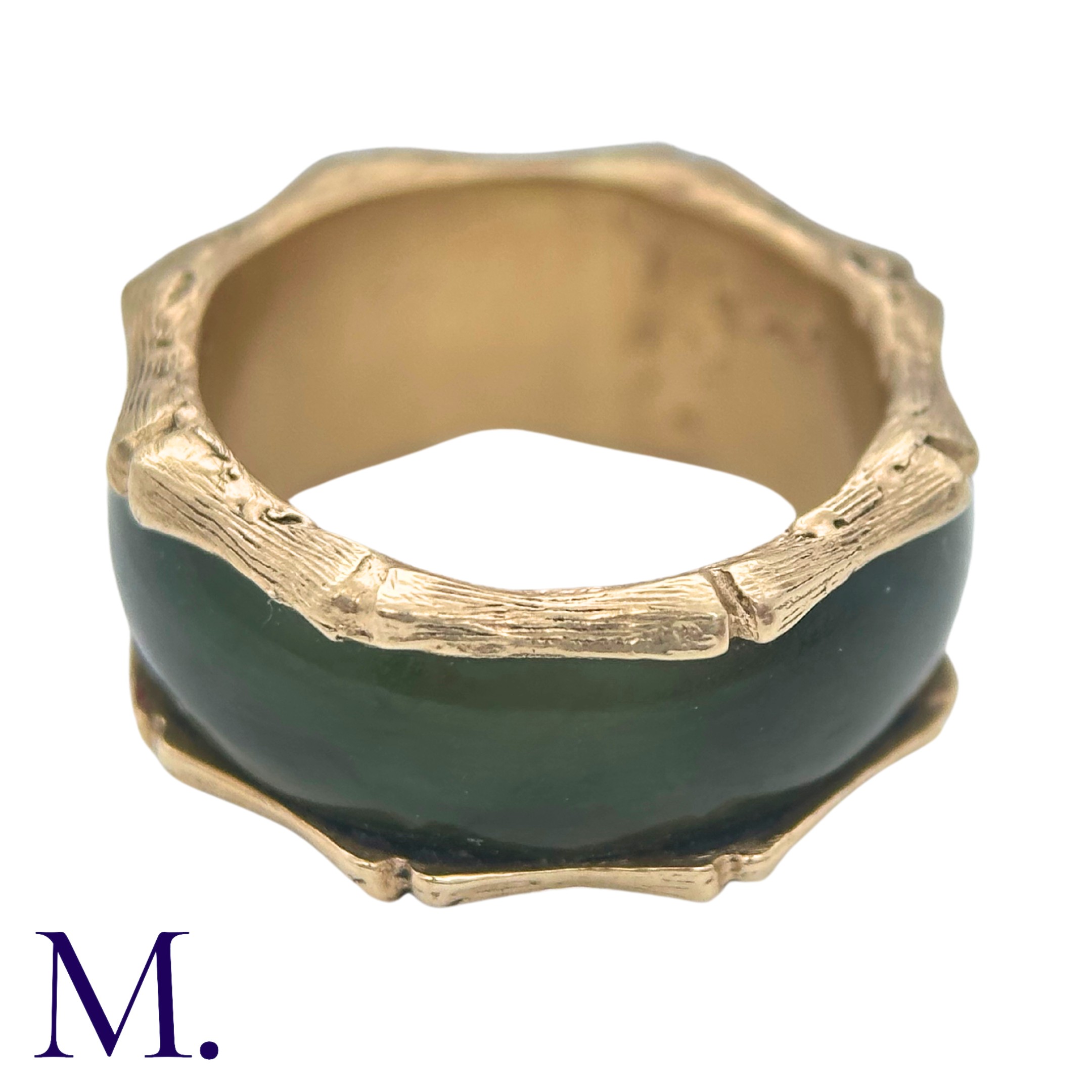 A Nephrite and Gold Ring in 14K yellow gold. The continuous nephrite band encircles the band with - Image 3 of 5