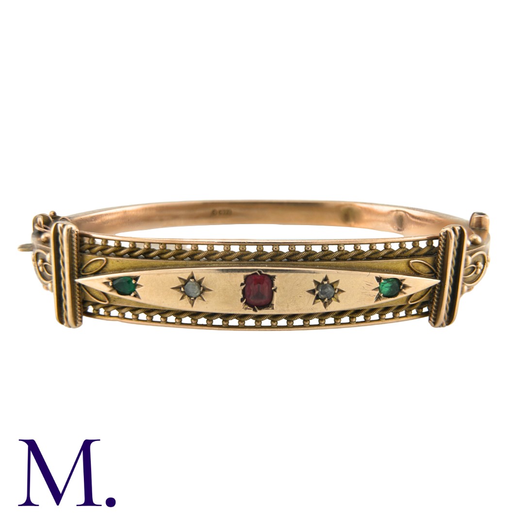 A Victorian Paste Bangle in 9K rose gold, with ropework and beading motifs. Stamped 375 for 9