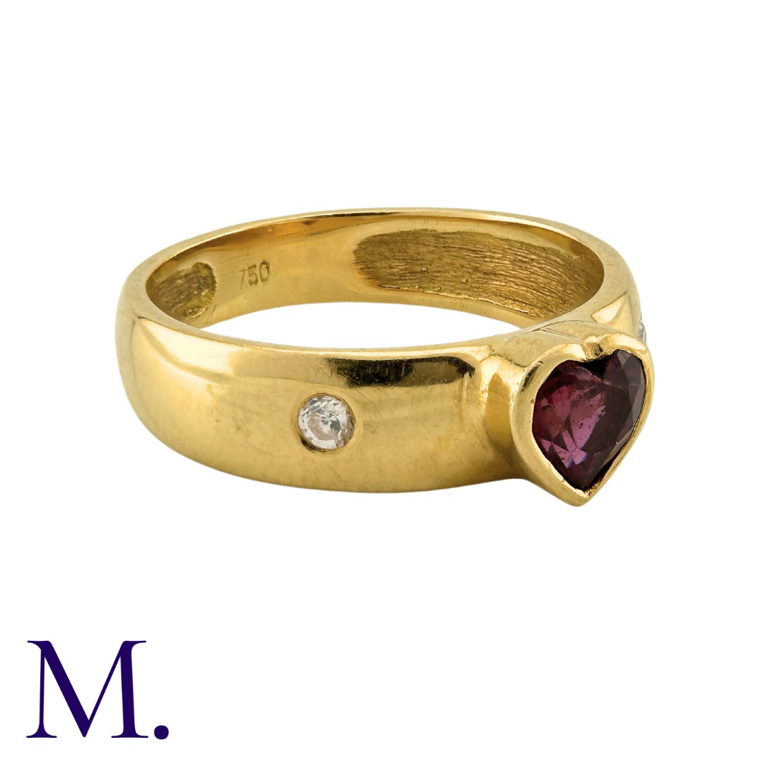 A Garnet and Diamond Ring in 18K yellow gold, with a heart-shaped Garnet and flush set diamonds. - Image 2 of 3