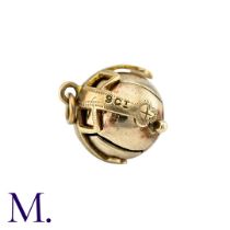 A Masonic Orb Pendant in 9k yellow gold and silver, the hinged spherical body opens to display a