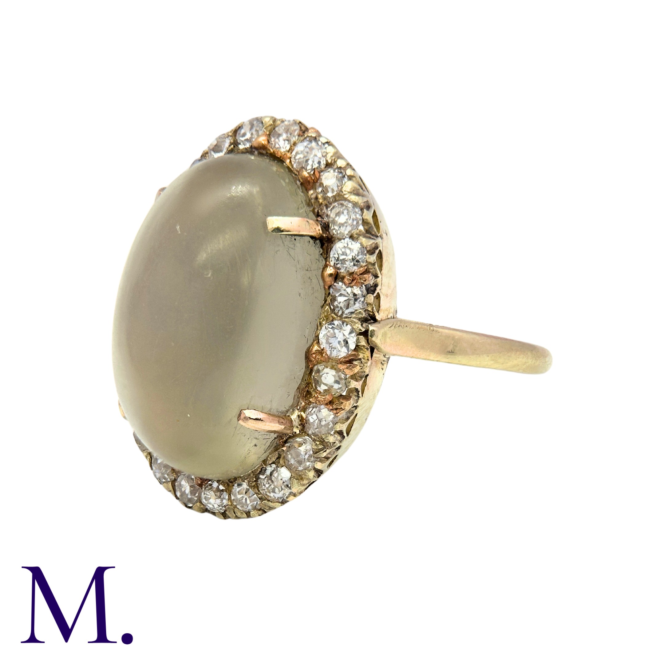 A Moonstone and Diamond Ring in 9K yellow gold, set with a large cabochon moonstone (18x11mm) with - Image 2 of 3