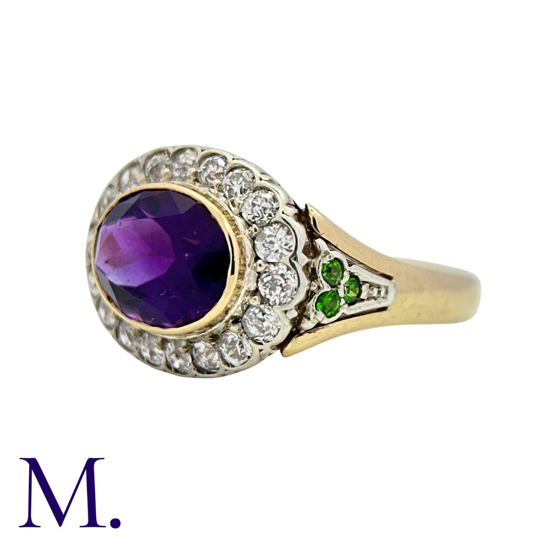 An Amethyst and Diamond Cluster Ring in yellow gold and silver, set with a principal oval cut - Image 3 of 3