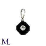 An Onyx And Diamond Pendant in platinum, comprising a polished octagonal plaque of onyx, inset