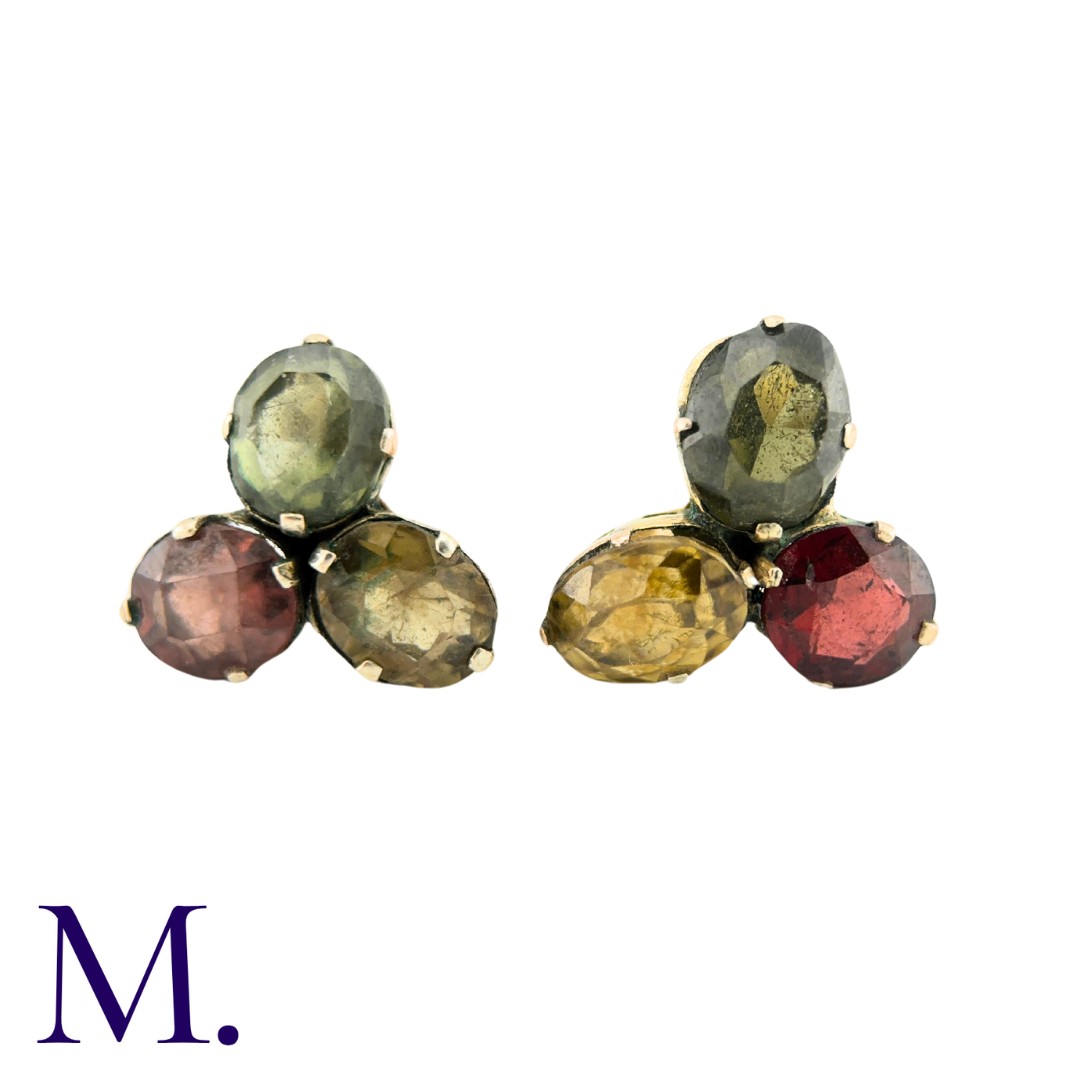 A Pair of Multi-Gem Earrings, each comprising a gem set, trefoil motif, of red yellow and green