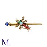 A Gem-Set Dragonfly Bar Brooch in 9ct gold, set with gemstones and pearls and hallmarked for 9ct