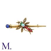 A Gem-Set Dragonfly Bar Brooch in 9ct gold, set with gemstones and pearls and hallmarked for 9ct