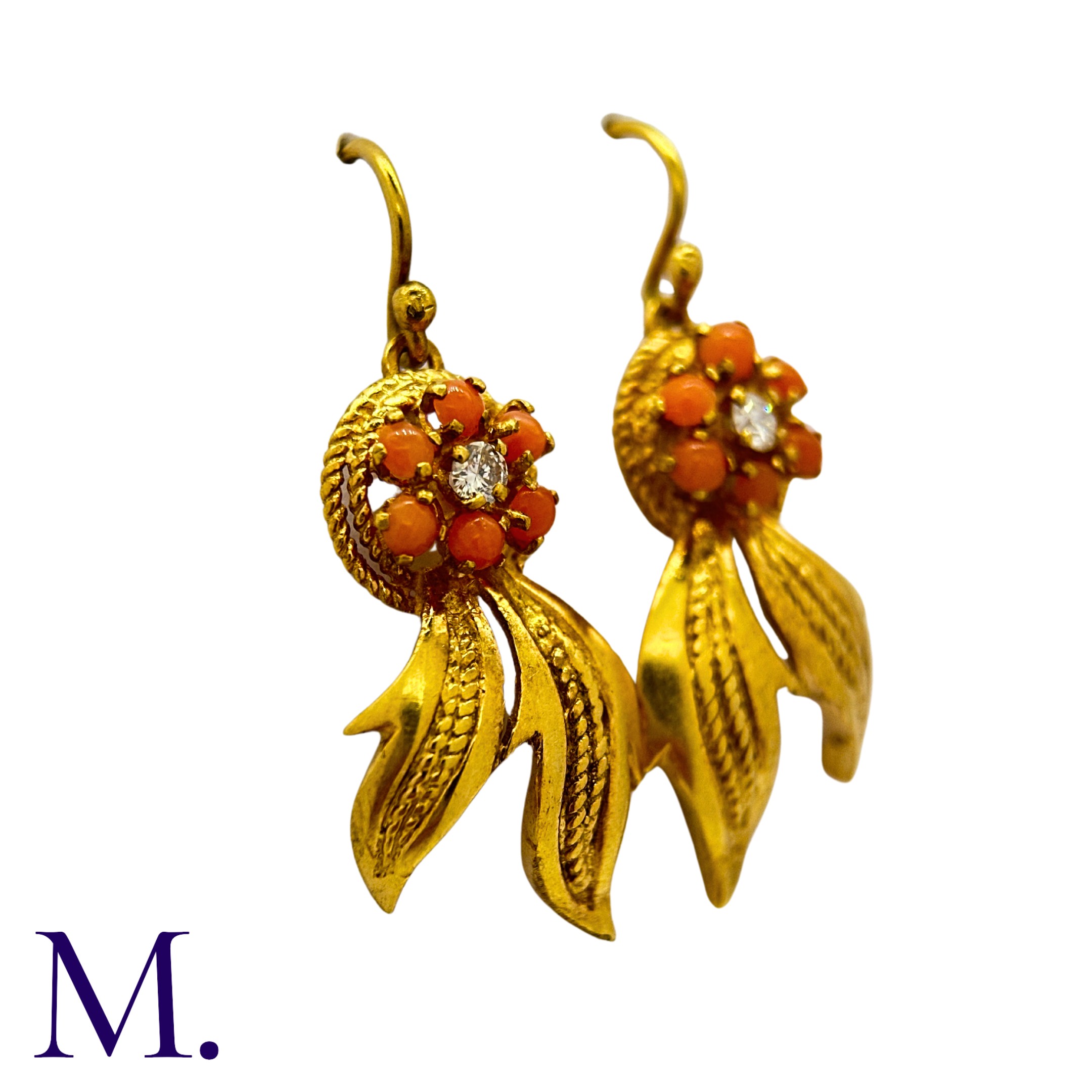 A Pair of Coral and Diamond Earrings in 18K yellow gold, set with six cabochons of coral around a
