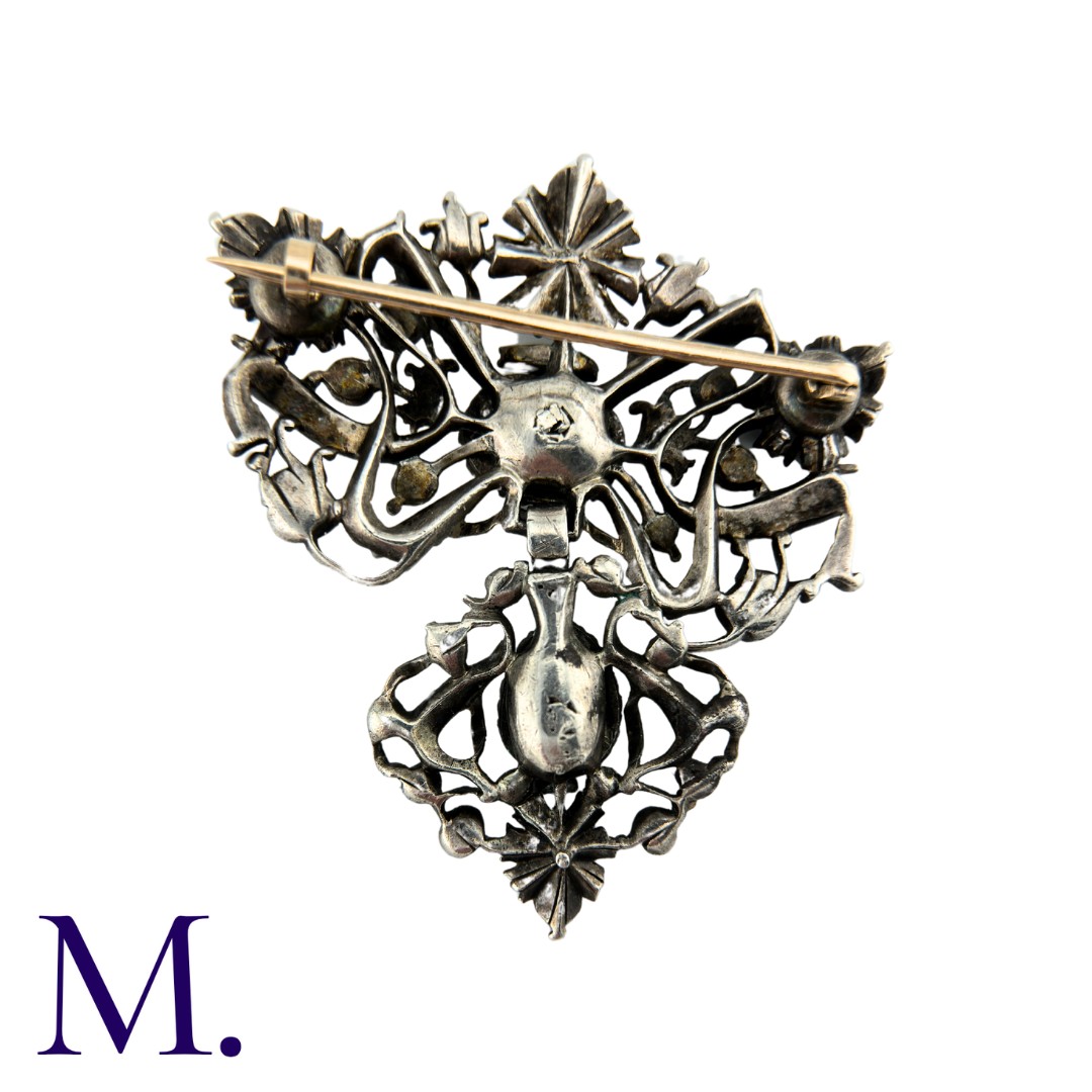 An Antique Rose Diamond Brooch in silver of foliate and bow motif, set with rose cut diamonds. - Image 2 of 3