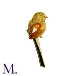 An Enamel Bird Brooch in 18K yellow gold, depicting a bird on a branch. French mark for 18ct gold.