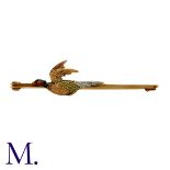 An Antique Pheasant Bar Brooch in 14K yellow gold and platinum, depicting a pheasant in flight.