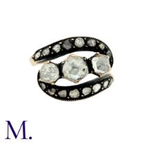 An Antique Diamond Twist Ring in gold and silver. Size: M Weight: 4.4g