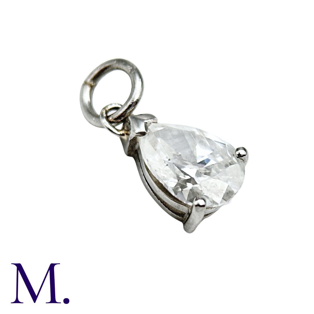 A Diamond Pendant in white gold, set with a pear-cut diamond weighing approximately 1.4ct. Size: 1. - Image 2 of 3