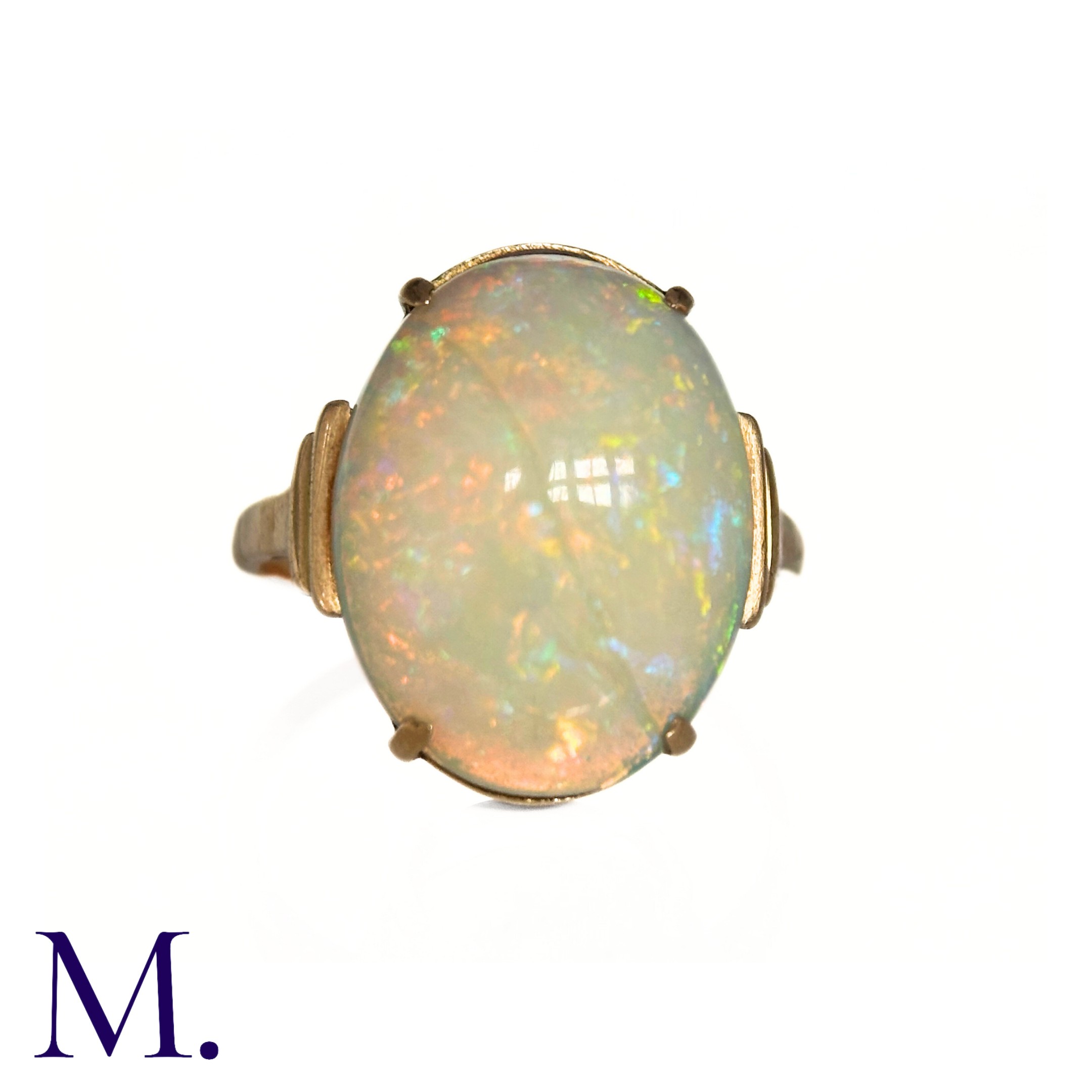 An Opal Ring in 9k yellow gold, set with a cabochon opal to stepped shoulders. Stamped 9ct. Size: - Image 2 of 7