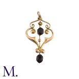 Amethyst And Pearl Pendant in 9k yellow gold, the open work foliate and scrolling form set with an