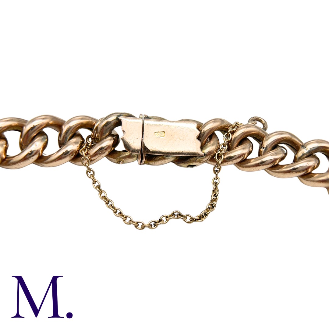 A Gold Curb Bracelet in 9K rose gold, with integrated fastening and safety chain. Size: 21cm Weight: - Image 3 of 3
