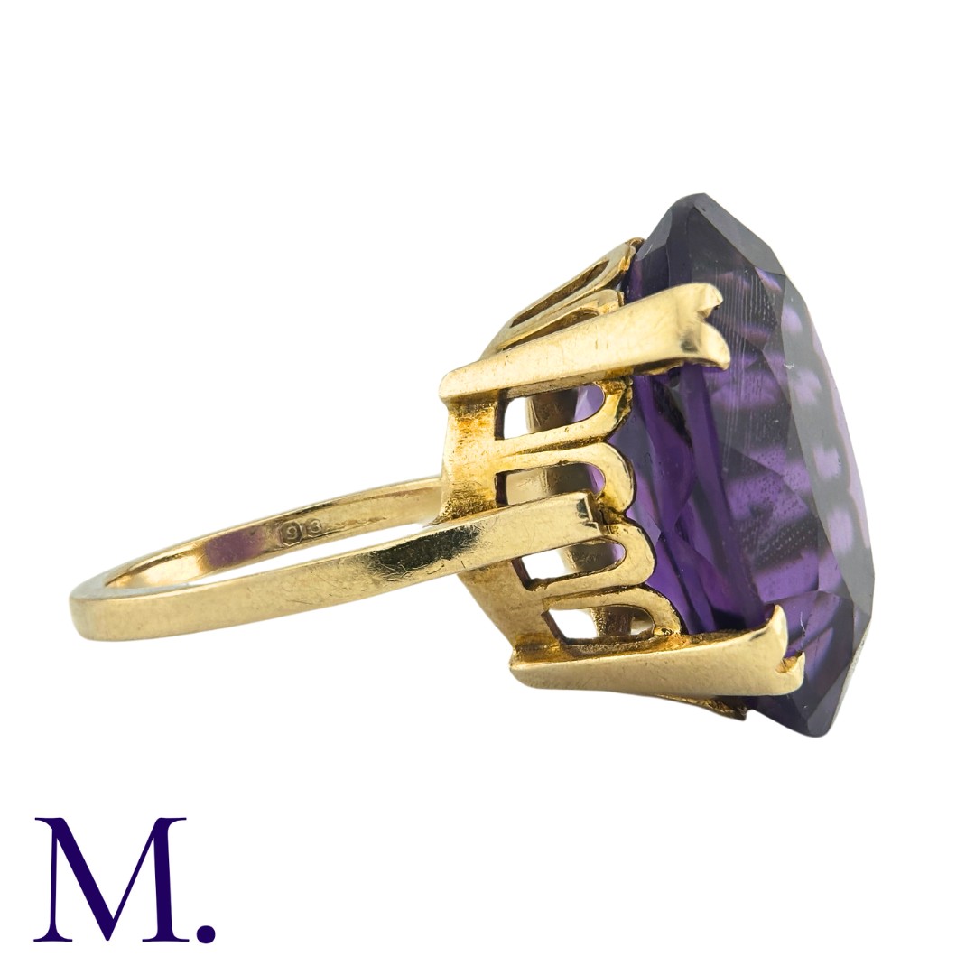 A Large Amethyst Ring in yellow gold, set with an oval cut amethyst weighing approximately 12.5ct. - Image 3 of 3