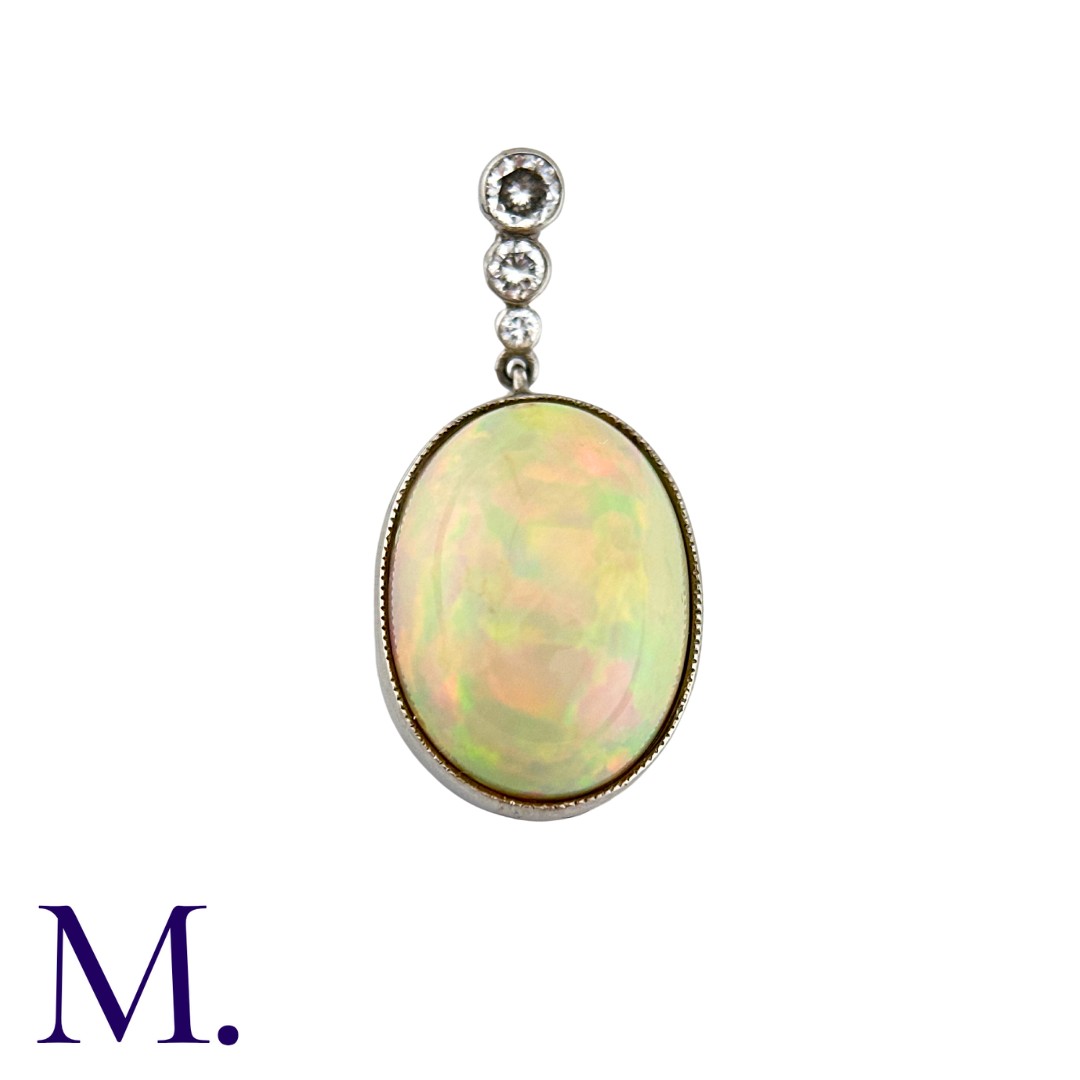 An Opal And Diamond Pendant in platinum, set with a principal cabochon opal of approximately 5.00cts - Image 2 of 2