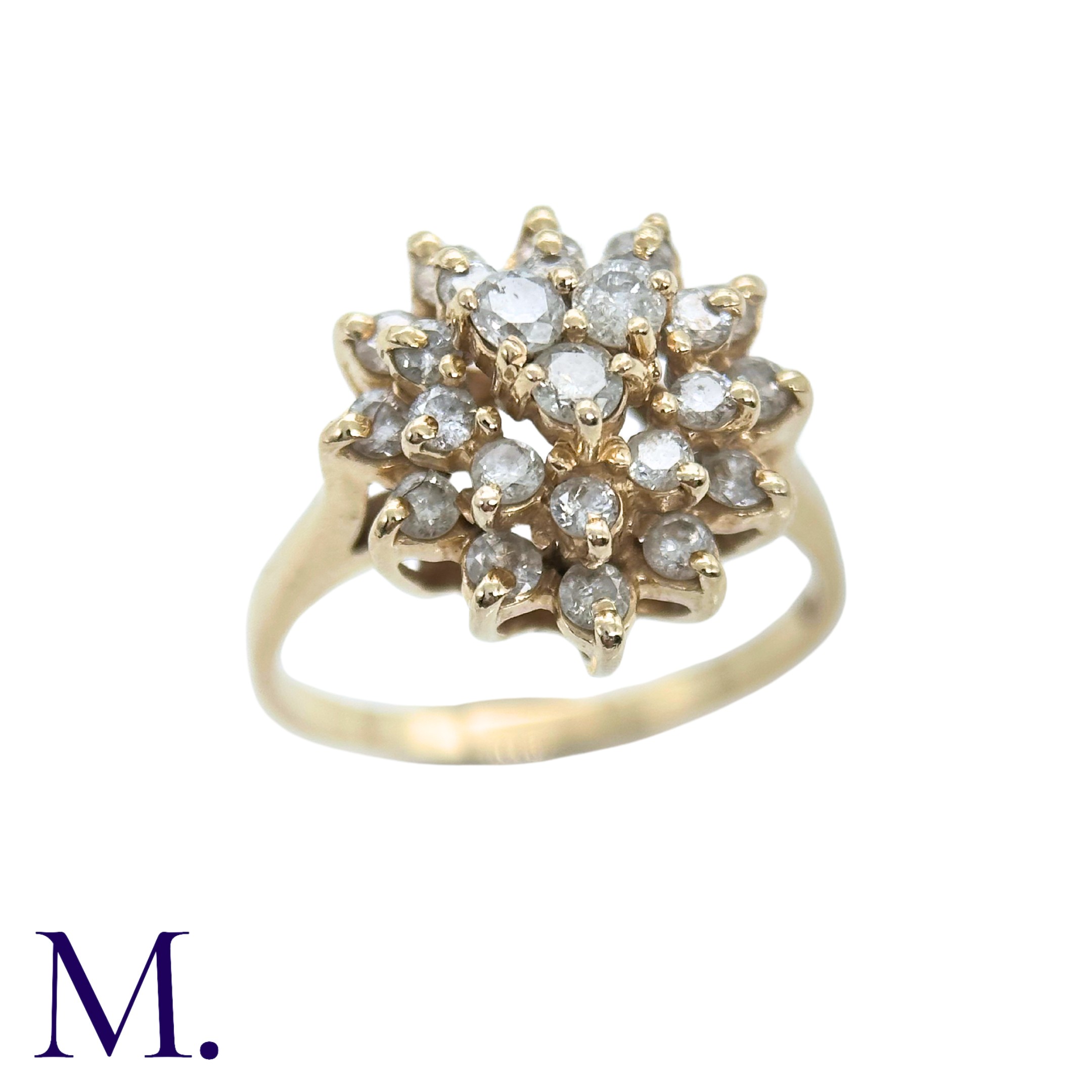 A Diamond Cluster Ring in 14k gold, set with a cluster of round cut diamonds. Stamped 14K, RL. Size: