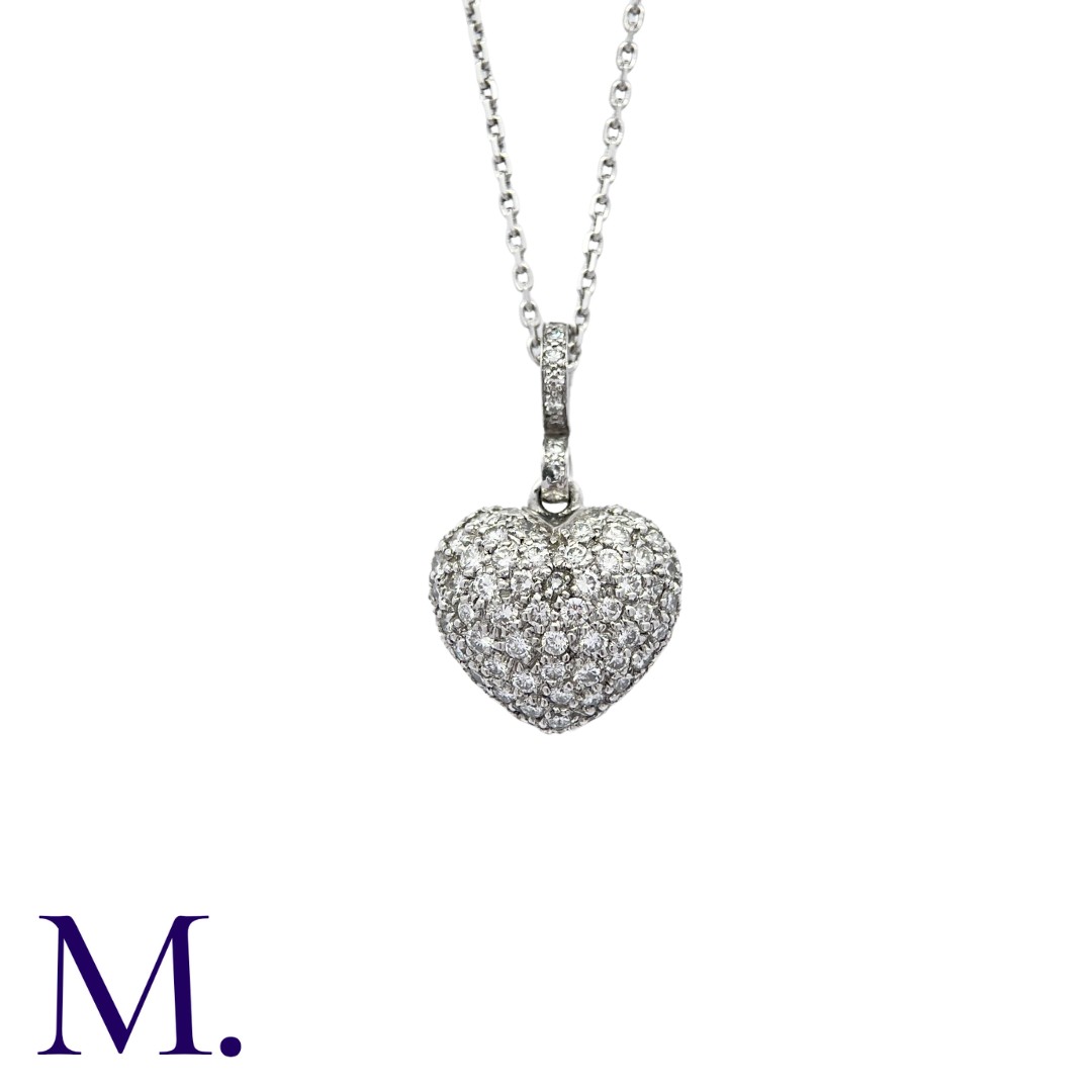 A Diamond Heart Pendant with Chain in 18K white gold, pavé set with diamonds, with diamond bail.