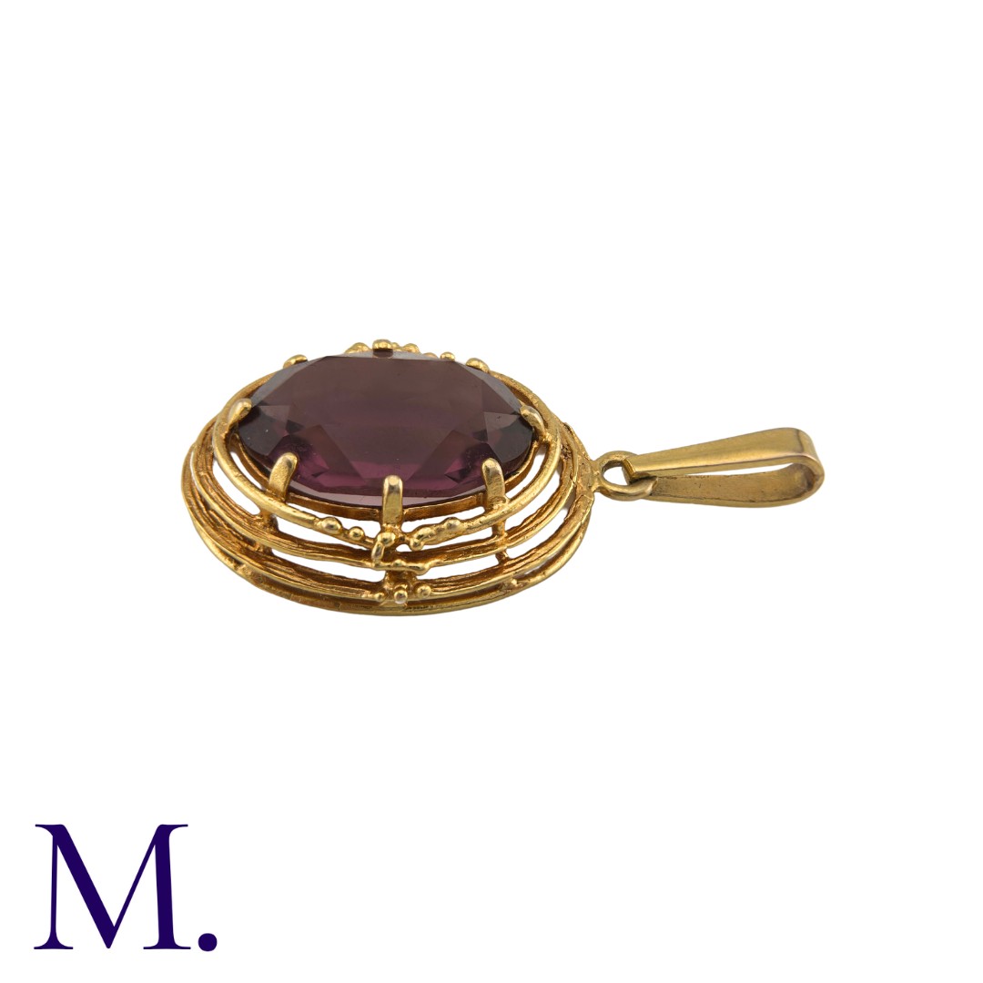 An Purple Stone Pendant in 9k yellow gold, comprising a large oval cut purple stone within a - Image 3 of 3