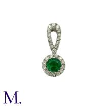 An Emerald and Diamond Pendant in 18K yellow gold, set with a round cut emerald with diamonds in
