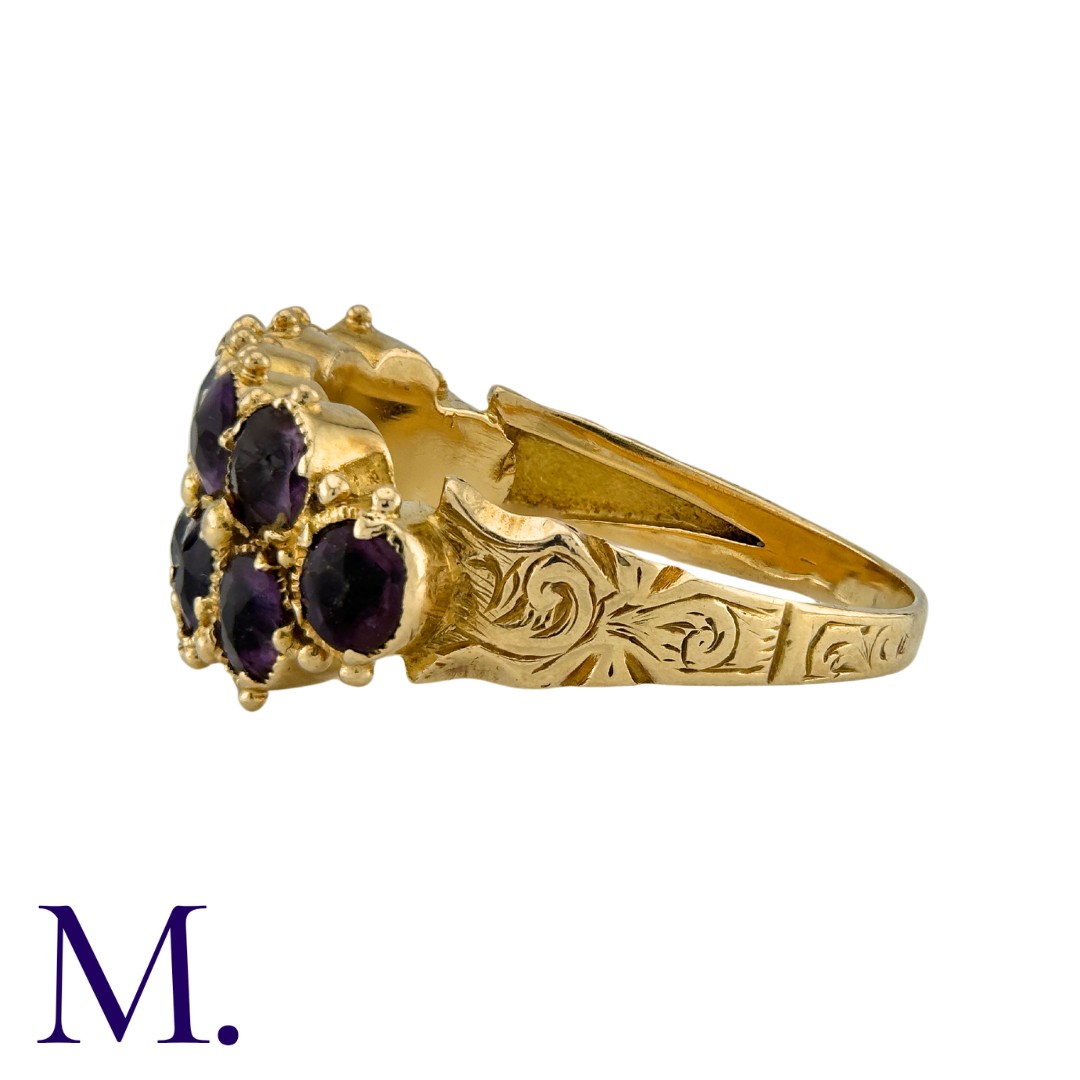 A Two-Row Amethyst Ring in yellow gold, set with twelve amethysts in two rows to an engraved band. - Image 3 of 4
