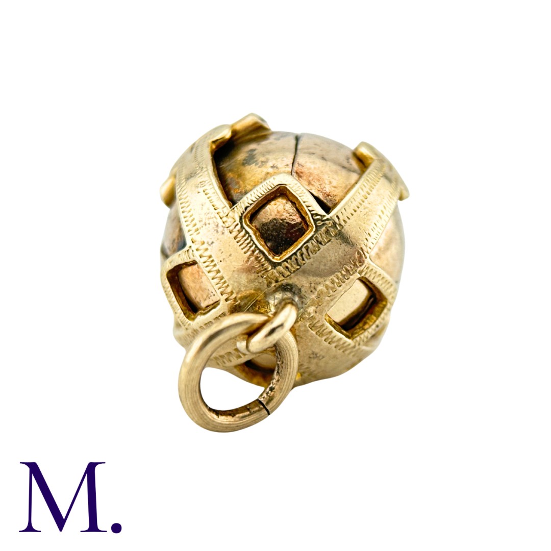 A Masonic Orb Pendant in 9k yellow gold and silver, the hinged spherical body opens to display a - Bild 2 aus 3