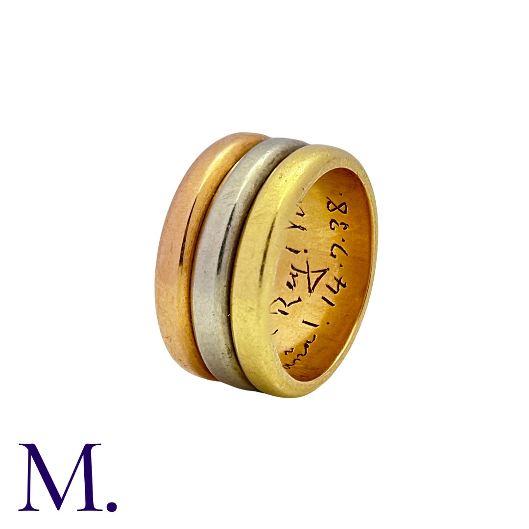 CARTIER. A Trinity Ring in 18K yellow, white and rose gold. Signed Cartier London and marked 18ct. - Image 2 of 2