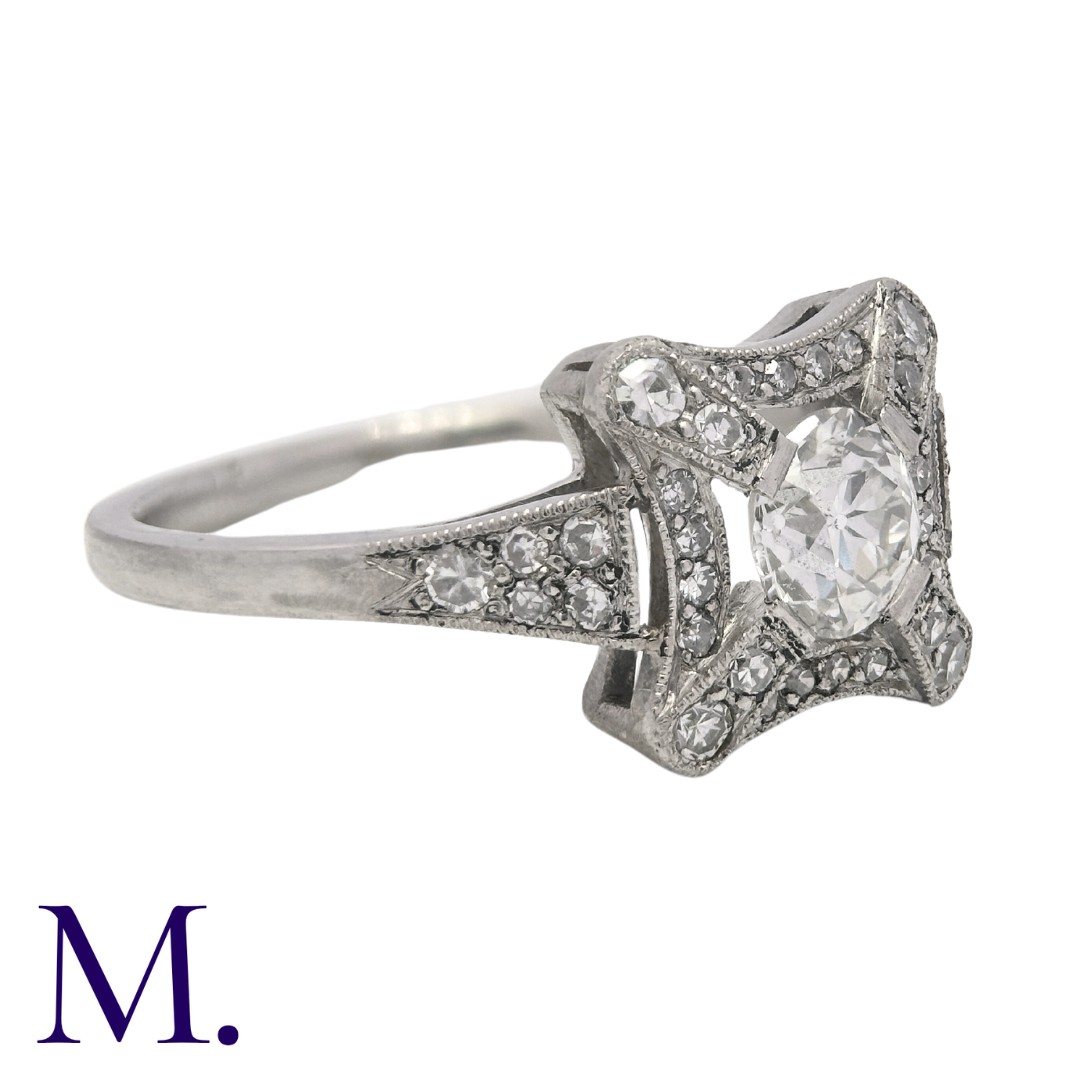 A Diamond Ring in platinum, set with a round cut diamond to the centre of approximately 0.60ct, with