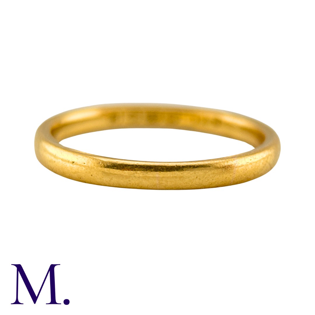 A 22ct Gold Band Ring, hallmarked for 22 carat gold. 2mm wide. Size: M Weight: 3.1g