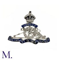 A Royal Artillery Enamel and Diamond Cap Badge in platinum and 18ct gold. Motto of 'Ubique Quo Fas