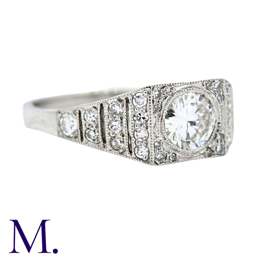 A Diamond Ring in 18K white gold, set with a diamond weighing approximately 0.75ct to the centre and - Image 2 of 3