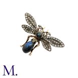An Antique Labradorite & Diamond Insect Brooch in 18K gold and silver, set with a pear-shaped