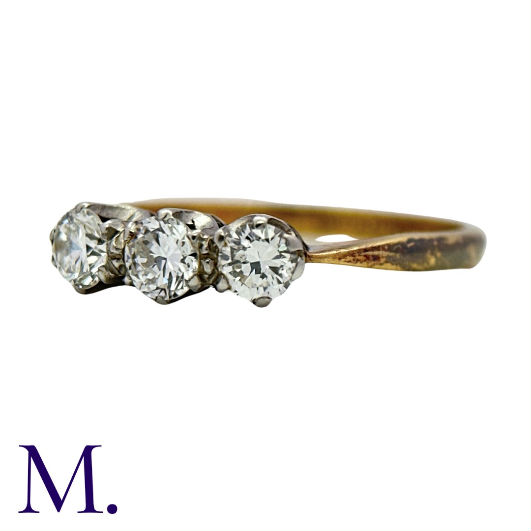 A 3-Stone Diamond Ring in yellow gold and platinum. Set with three round brilliant cut diamonds - Image 2 of 3