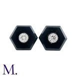 A Pair Of Onyx And Diamond Stud Earrings in platinum, the hexagonal onyx plaques each set