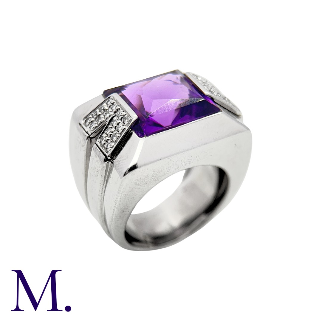 VERSACE. An Amethyst and Diamond Ring in 18K white gold, set with a large fancy faceted-