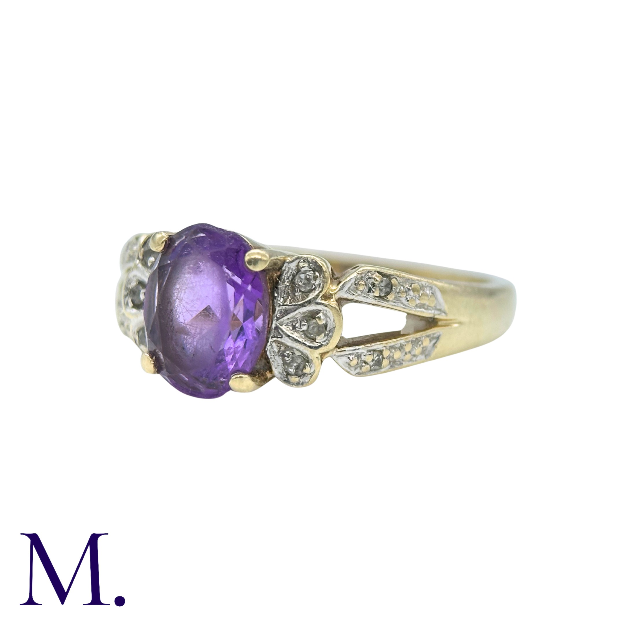 An Amethyst And Diamond Ring in 9k yellow gold, set with a central oval cut amethyst, accented by - Image 2 of 4