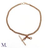 An Antique 9ct Gold Albert Chain The 9ct rose gold Albert chain terminates in a T-Bar and is secured