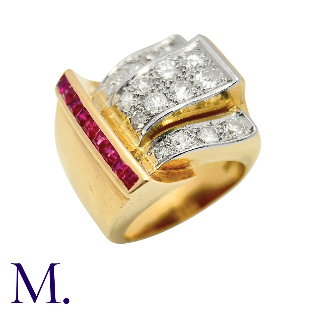 A Ruby & Diamond Retro Ring in 18K yellow gold, set with 16 old and transitional cut diamonds and
