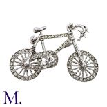 A Diamond Bicycle Brooch in 18K white gold, set with approximately 0.70ct of diamonds, with moving