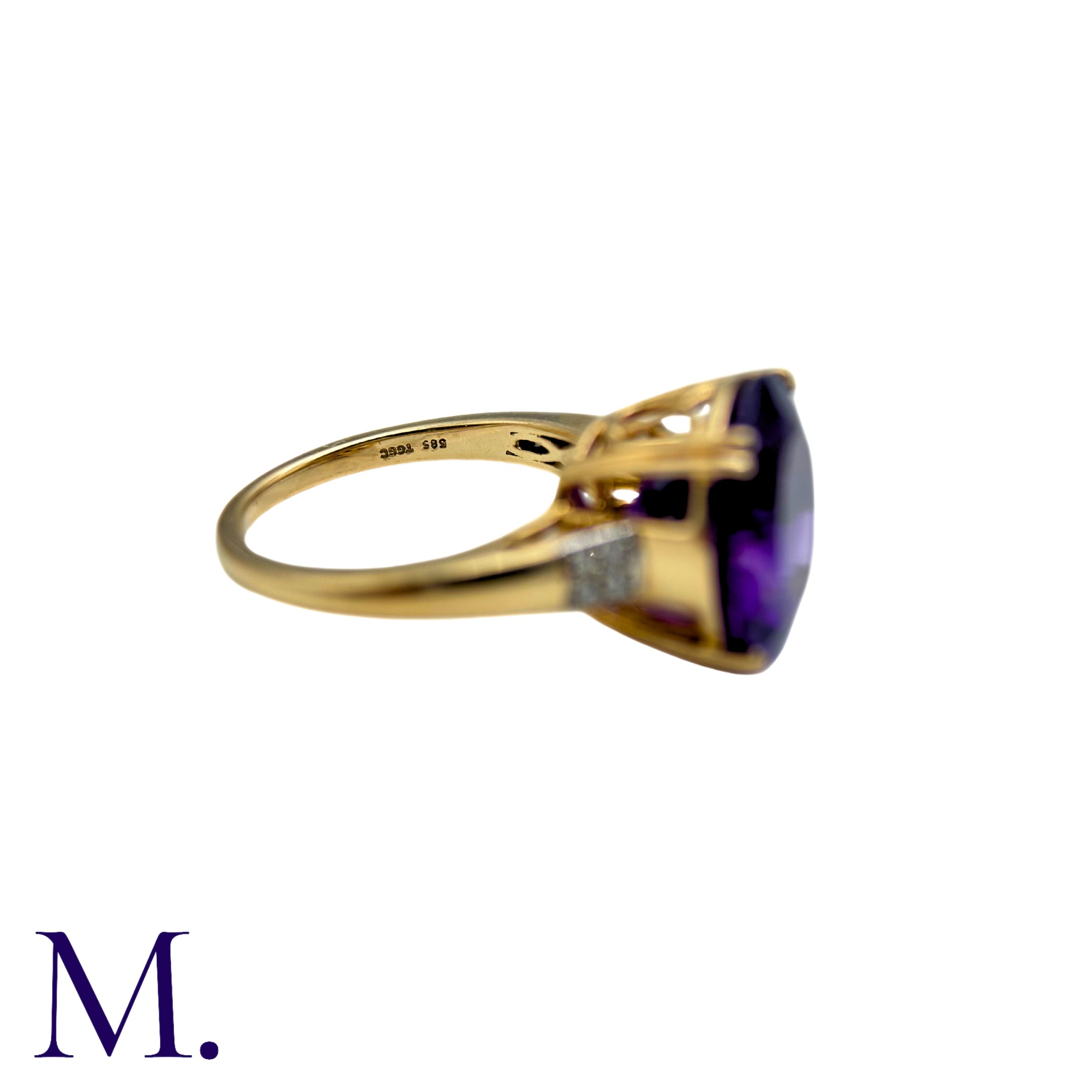 An Amethyst And Diamond Ring in 14k yellow gold, set with a principal round cut amethyst of - Image 4 of 5