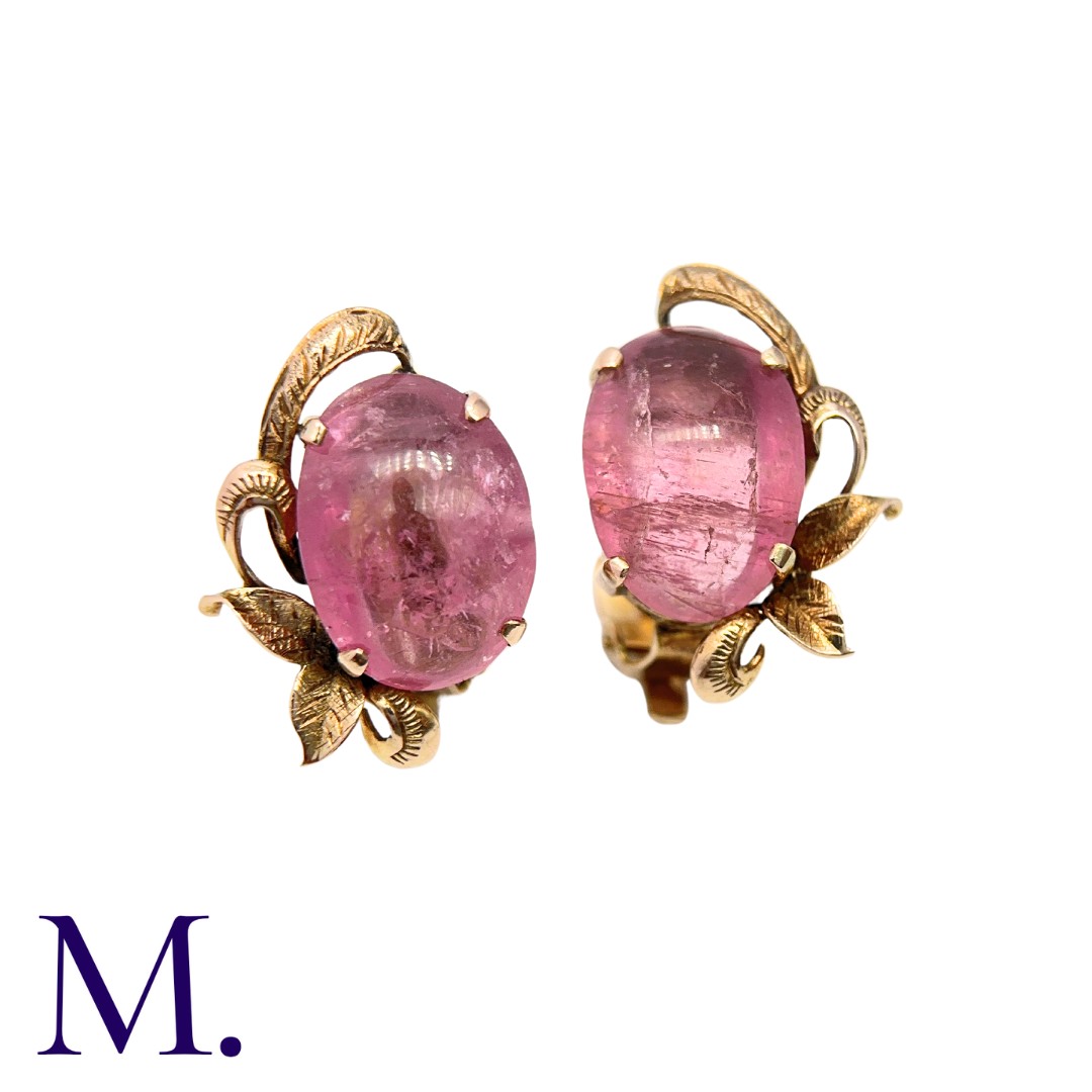 A Pair of Pink Tourmaline Earrings in 14K yellow gold, set with demi-lune cabochon pink