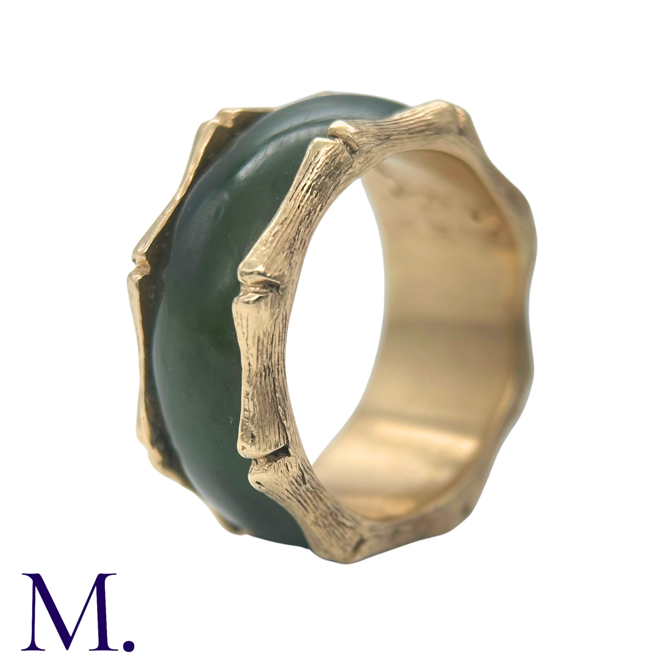 A Nephrite and Gold Ring in 14K yellow gold. The continuous nephrite band encircles the band with - Image 4 of 5