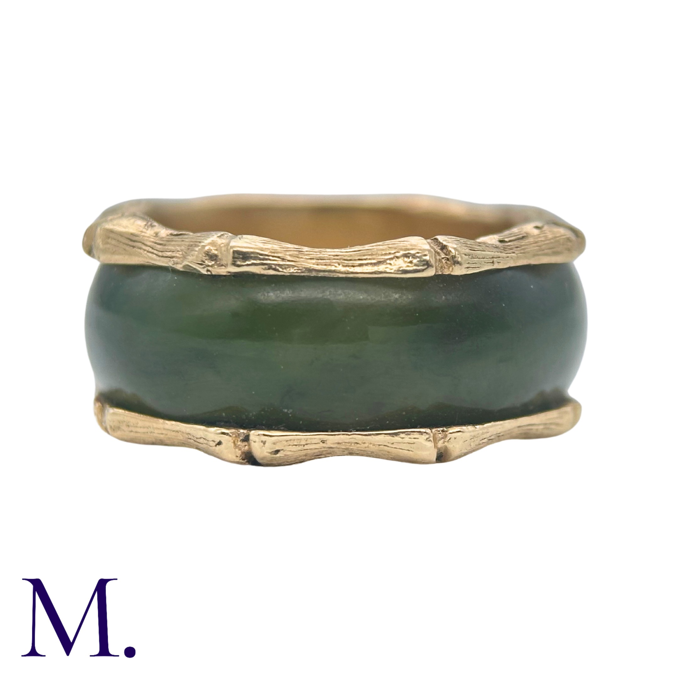 A Nephrite and Gold Ring in 14K yellow gold. The continuous nephrite band encircles the band with - Image 2 of 5