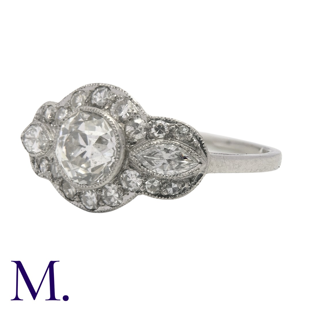 A Diamond Ring in white gold set with a principal diamond weighing approximately 0.90ct with two - Image 2 of 3